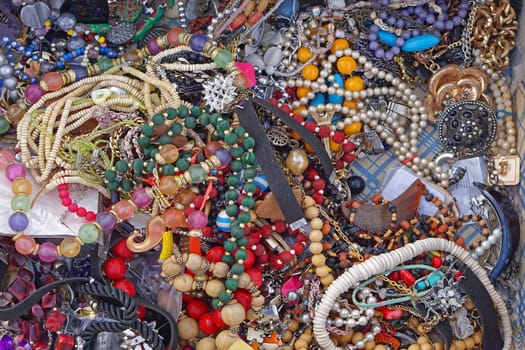 Various modern bijou necklaces for sale at flea market