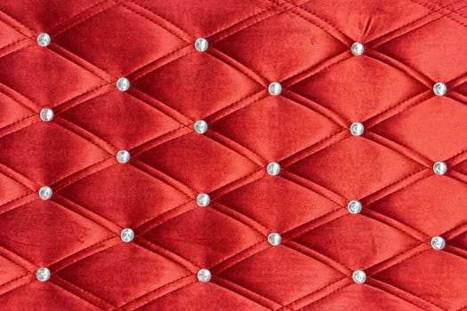 Red upholstery pattern with zircons decoration background