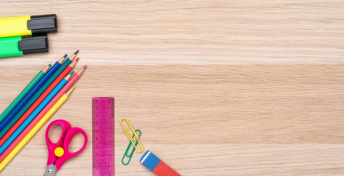 School supplies on a desk with copy space