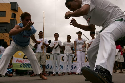 eunapolis, bahia / brazil - september 24, 2010: people are seen in capoeira roda in the city of Eunapolis.
