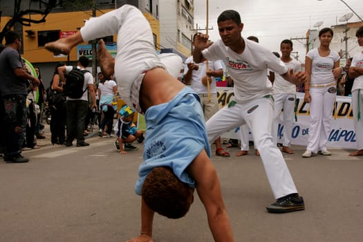 eunapolis, bahia / brazil - september 24, 2010: people are seen in capoeira roda in the city of Eunapolis.