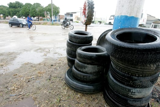 eunapolis, bahia / brazil - february 9, 2011: used tires are seen near a tire shop in the city of Eunapolis..
