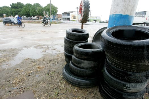 eunapolis, bahia / brazil - february 9, 2011: used tires are seen near a tire shop in the city of Eunapolis..