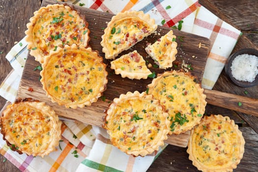 Mini quiche with egg and bacon bits