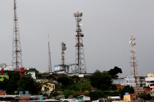 itabuna, bahia / brazil - july 15, 2012: tower with cell antennas is seen in the city of Itabuna, southern Bahia.