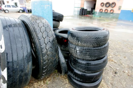 eunapolis, bahia / brazil - february 9, 2011: used tires are seen near a tire shop in the city of Eunapolis..