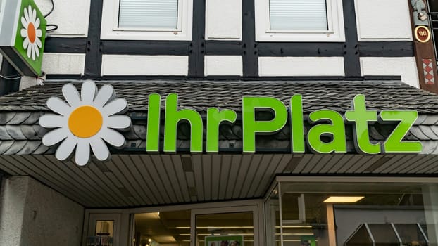 Waldecker Land, GERMANY - 2019-07-16 IHR PLATZ Logo on a facade in WALDECKER LAND. IHR PLATZ GmbH & Co. KG i.I. was a drugstore chain in Germany based in Osnabrück