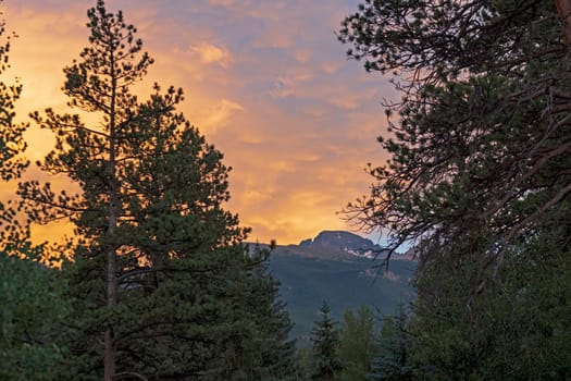 Sunset Clouds Over the Mountains in Rocky Mountain National Park in Colorado