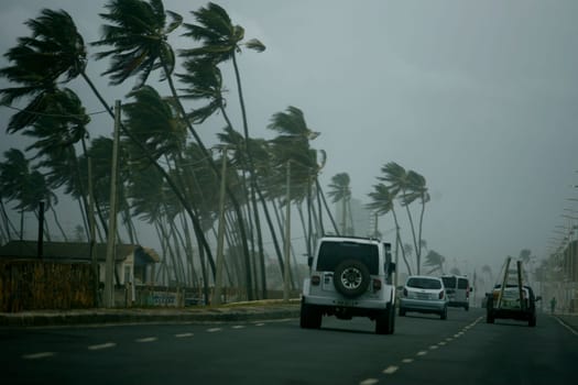 salvador, bahia / brazil - october 4, 2014: vehicles are seen walking on a street in the city of Salvador during rainy weather...