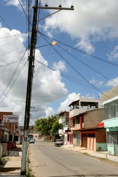 itabuna, bahia / brazil - april 13, 2012: street lamp post is seen lit during the day in the city of Itabuna.
