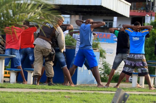 salvador, bahia / brazil - april 4, 2017: Military Police officers from Bahia search suspect people in the city of Salvador.