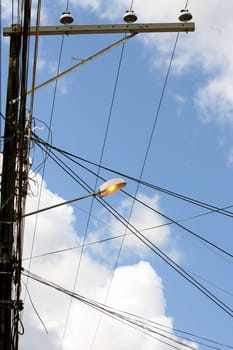 itabuna, bahia / brazil - april 13, 2012: street lamp post is seen lit during the day in the city of Itabuna.