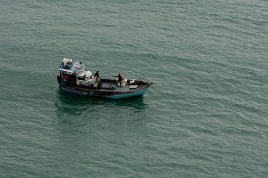 porto seguro, bahia / brazil - june 20, 2011: aerial view of a fishing boat at sea in the Trancoso region, in the city of Porto Seguro, in the south of Bahia...