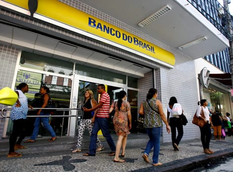salvador, bahia / brazil - september 24, 2014: people are seen near the facade of a Banco do Brasil branch in downtown Salvador.