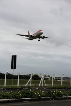 salvador, bahia / brazil - april 14, 2013: aircraft Airbus The 320-200 of the airline Avianca is seen during an approach for landing at the airport of the city of Salvador.