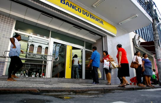 salvador, bahia / brazil - september 24, 2014: people are seen near the facade of a Banco do Brasil branch in downtown Salvador.