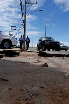 salvador, bahia / brazil - april 3, 2014: damaged walking area in the pituba neighborhood in the city of Salvador.