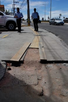 salvador, bahia / brazil - april 3, 2014: damaged walking area in the pituba neighborhood in the city of Salvador.