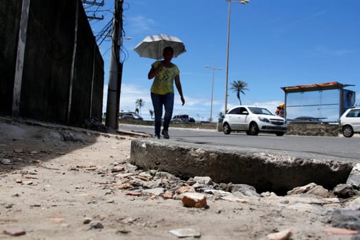 salvador, bahia / brazil - april 3, 2014: damaged walking area in the pituba neighborhood in the city of Salvador.