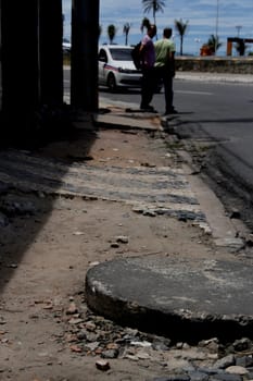 salvador, bahia / brazil - april 3, 2014: damaged walking area in the pituba neighborhood in the city of Salvador.