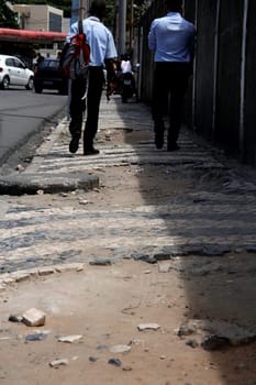 salvador, bahia / brazil - april 3, 2014: damaged walking area in the pituba neighborhood in the city of Salvador.