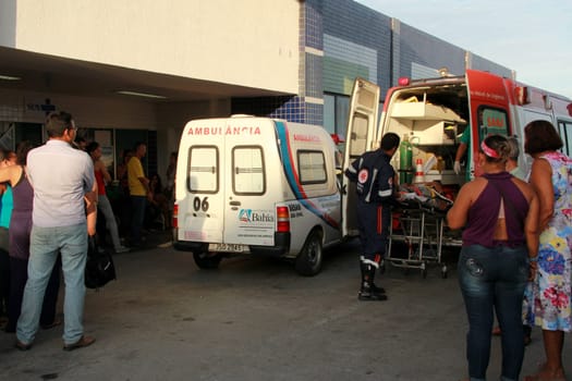 salvador, bahia / brazil - november 28, 2012: people are seen next to an ambulance of Samu 192, near the emergency of Hospital Roberto Santos in the city of Salvador.