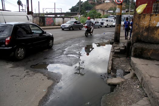 salvador, bahia / brazil - july 16, 2013: exposed sewage is seen in the Calcada neighborhood in the city of Salvador.