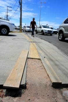 salvador, bahia / brazil - april 3, 2014: damaged walking area in the pituba neighborhood in the city of Salvador.