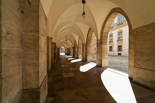 Arch Minoritenkirche Vienna, thoroughfare of church at Minoritenplatz in Innere Stadt of austrian capital city
