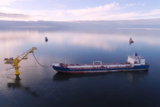 The tanker is filled with liquefied natural gas, transporting gas by sea.