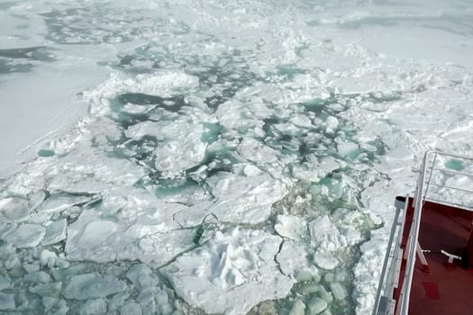 The feed of a ship sailing in the Arctic. Landscape of the Arctic from the deck of the tanker.