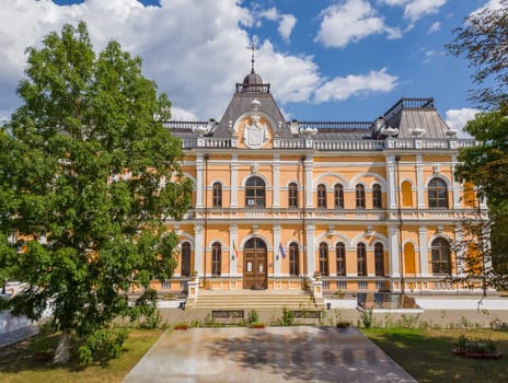The Manuc Bei mansion, an architectural, culture and historic complex with museum, winery and other edifices located in Hincesti city, Moldova. Manuc Bey palace facade and yard in a sunny summer day..
