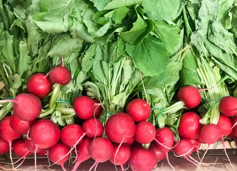 High Angle View Of Radish For Sale. Healthy Fresh Food Background.