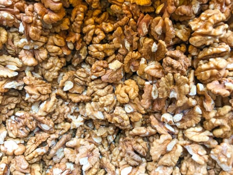 Close-Up Of Peeled Walnuts. Healthy Fresh Food Background.