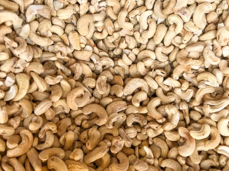 Close-Up Of Cashew Nuts Peeled. Healthy Fresh Food Background.