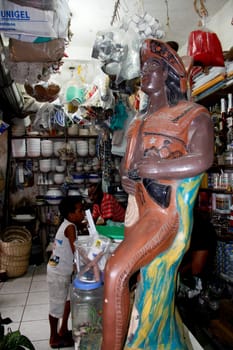 salvador, bahia / brazil - april 21, 2013: article religios for members of the Candomble religion are seen for sale at the Sao Joaquim fair in the city of Salvador.