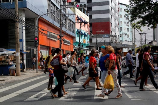 salvador, bahia / brazil - january 23, 2013: people are seen crossing the street in a pedestrian lane in downtown Salvador..