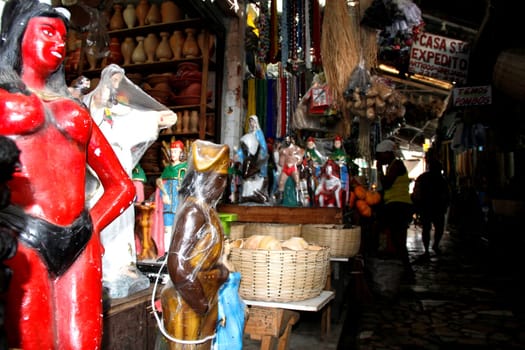 salvador, bahia / brazil - april 21, 2013: article religios for members of the Candomble religion are seen for sale at the Sao Joaquim fair in the city of Salvador.