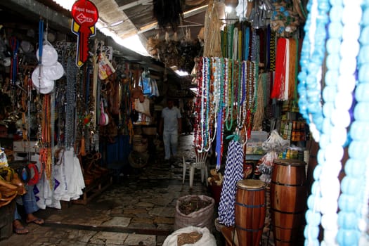 salvador, bahia / brazil - april 21, 2013: article religios for members of the Candomble religion are seen for sale at the Sao Joaquim fair in the city of Salvador.