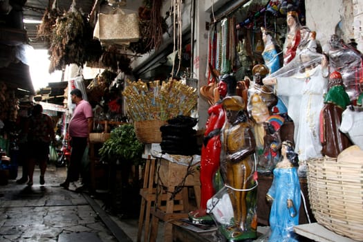 salvador, bahia / brazil - april 21, 2013: article religios for members of the Candomble religion are seen for sale at the Sao Joaquim fair in the city of Salvador.