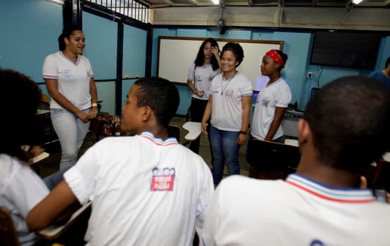 salvador, bahia / brazil - august 18, 2015: public school students are seen in a school classroom in the city of Salvador.
