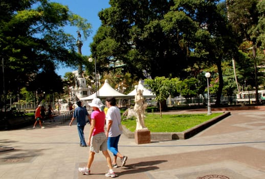 salvador, bahia / brazil - march 28, 2014: person is seen walking through Campo Grande square in the city of Salvador.