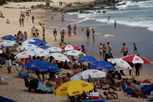 salvador, bahia / brazil - november 23, 2014: People are seen at the Barra beach in the city of Salvador.