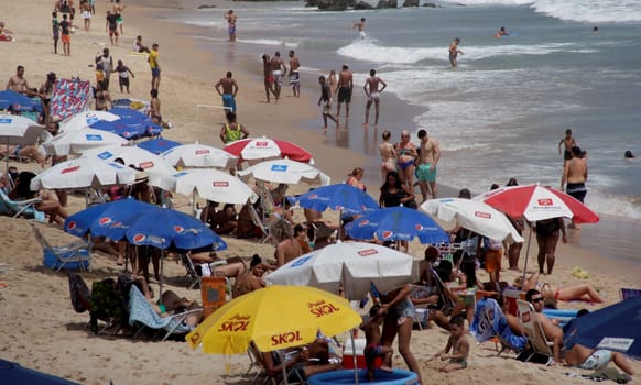 salvador, bahia / brazil - november 23, 2014: People are seen at the Barra beach in the city of Salvador.