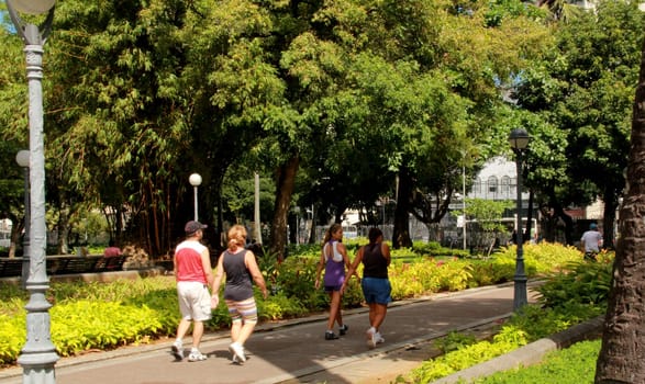 salvador, bahia / brazil - march 28, 2014: person is seen walking through Campo Grande square in the city of Salvador.