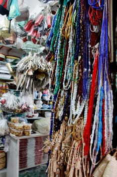 salvador, bahia / brazil - april 21, 2013: article religios for members of the Candomble religion are seen for sale at the Sao Joaquim fair in the city of Salvador.