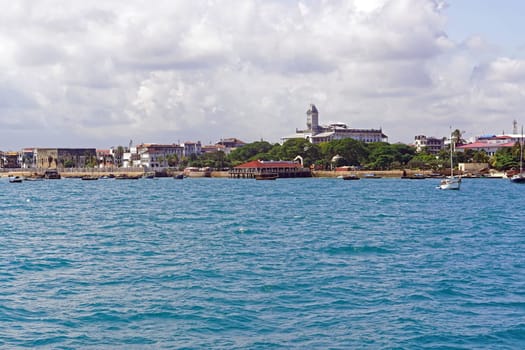 Zanzibar, Tanzania - July 16, 2017: Cityscape coastline from sea in Zanzibar, Tanzania.