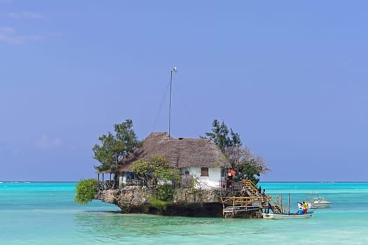 Zanzibar, Tanzania - July 20, 2017: The Rock restaurant on small island in Zanzibar, Tanzania.