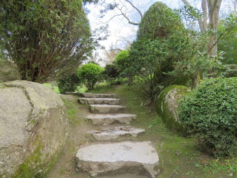 Beautiful Japanese garden in the city of Toulouse with lake and bridge