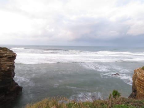 Beautiful beach of the cathedrals with the sea very finely chopped many waves and large